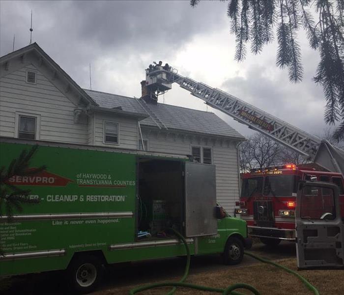 Firefighters and SERVPRO respond to a house fire