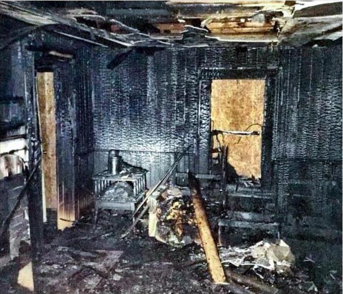 Inside of a home severely damaged by fire